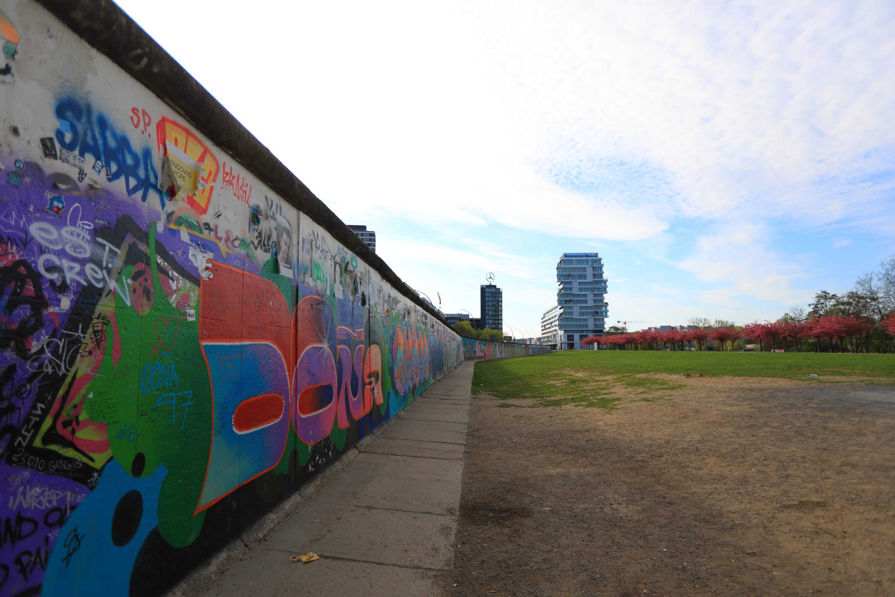 Colourful murals at the East Side Gallery tell stories of freedom, hope, and artistic expression.